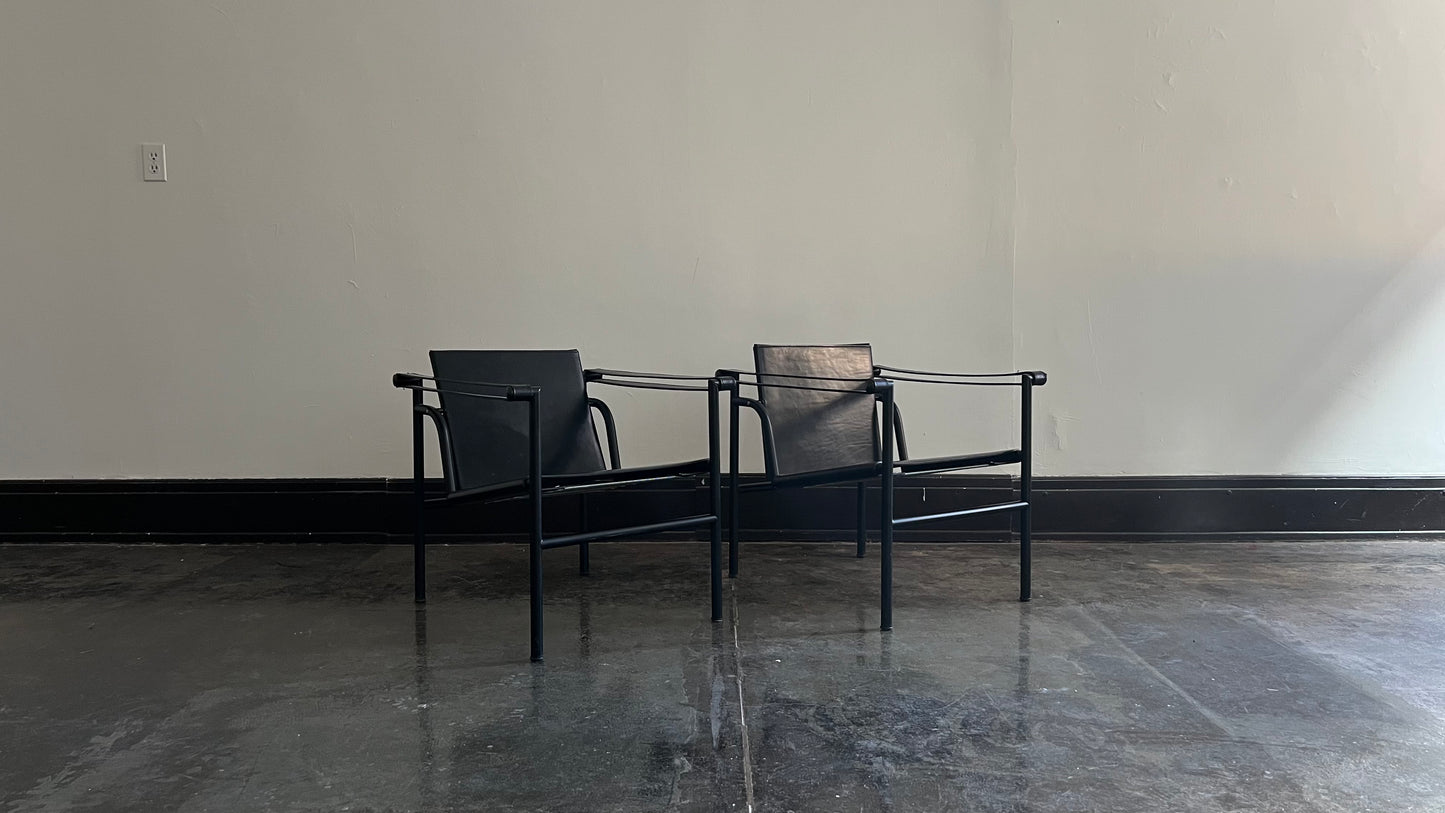 LC1 Chairs by Le Corbusier, Pierre Jeanneret, and Charlotte Perriand for Cassina (Pair)