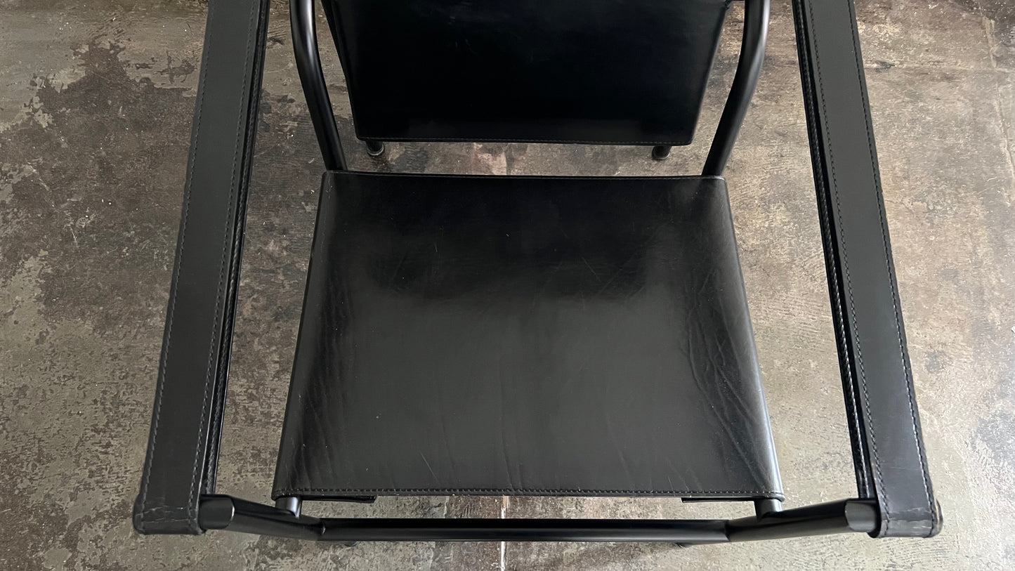 LC1 Chairs by Le Corbusier, Pierre Jeanneret, and Charlotte Perriand for Cassina (Pair)